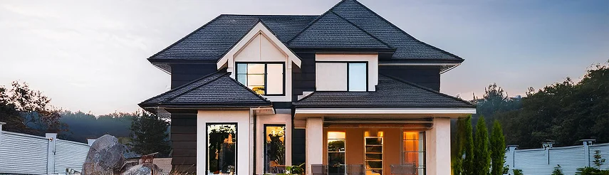 Contemporary ACT home lit at dusk