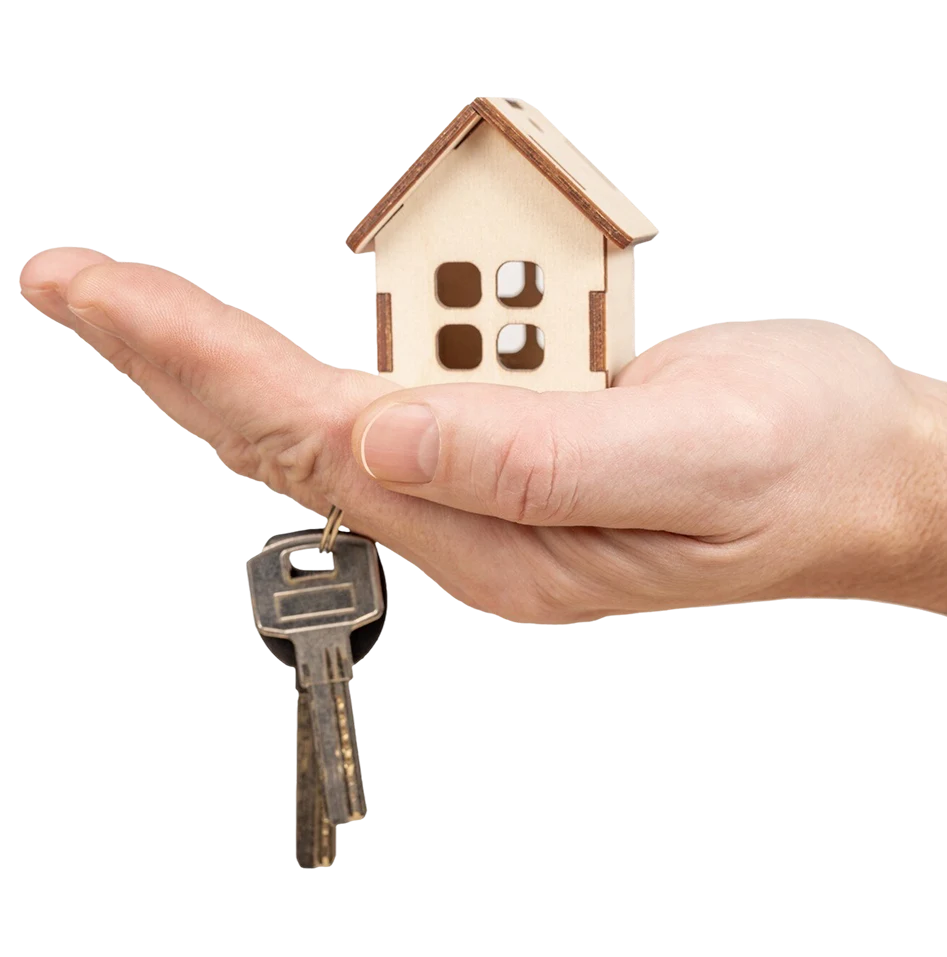 Hand holding a model house